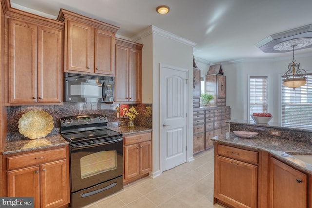 kitchen featuring pendant lighting, crown molding, black appliances, and backsplash