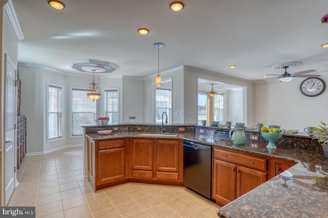 kitchen with sink, crown molding, dishwasher, and hanging light fixtures