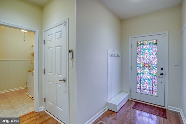 entrance foyer with hardwood / wood-style floors