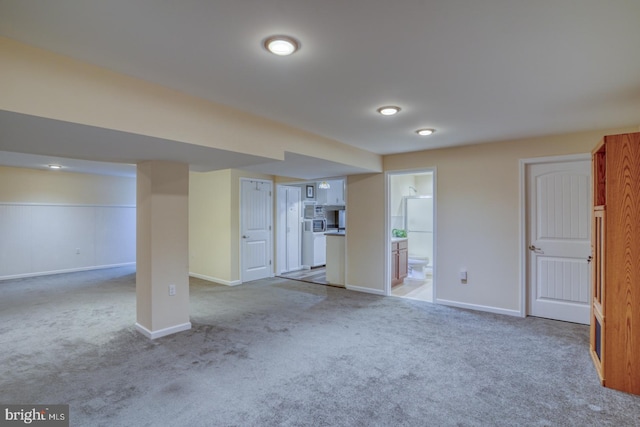 basement with light colored carpet