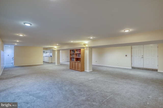 basement with carpet flooring