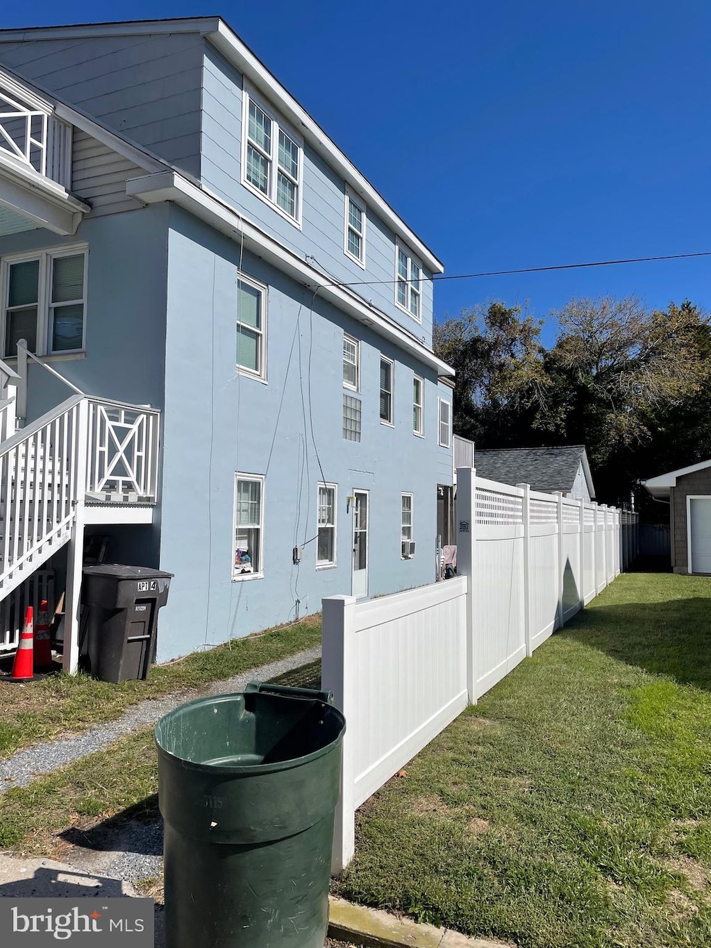 view of home's exterior featuring a lawn