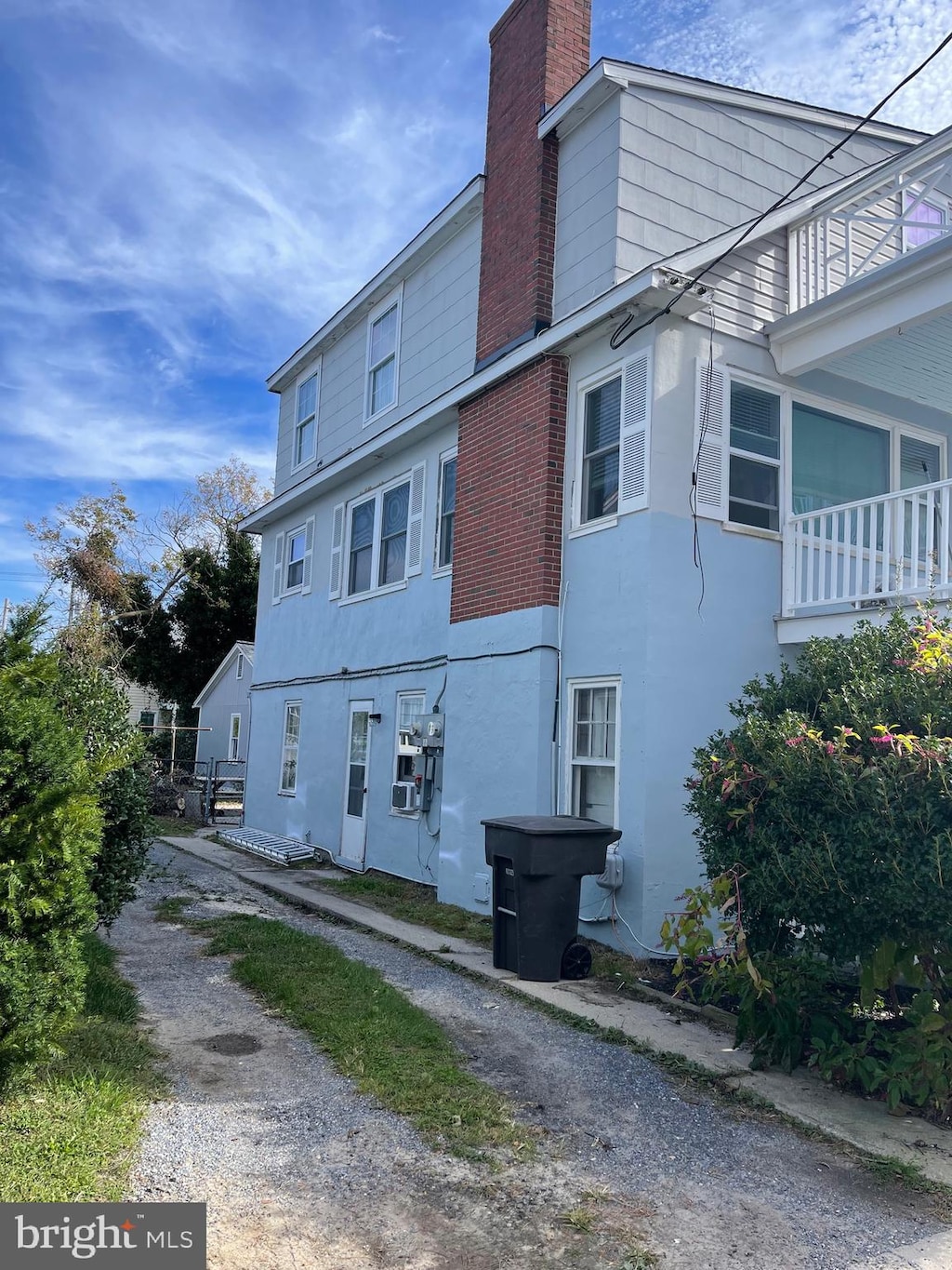 view of property exterior with a balcony