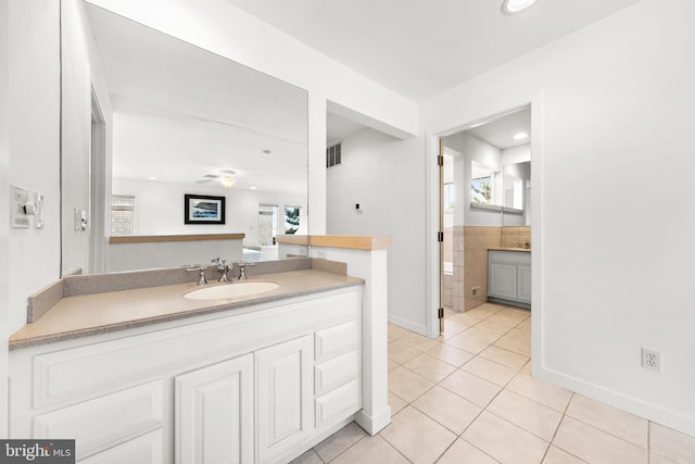 1039 Long Beach Blvd, Long Beach Township, NJ 08008 - bathroom with tile patterned floors, healthy amount of natural light, vanity, a ceiling fan, and recessed lighting