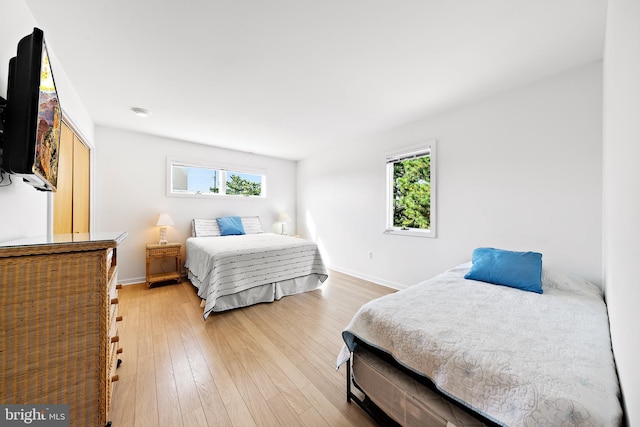 1039 Long Beach Blvd, Long Beach Township, NJ 08008 - bedroom with light wood-type flooring and baseboards