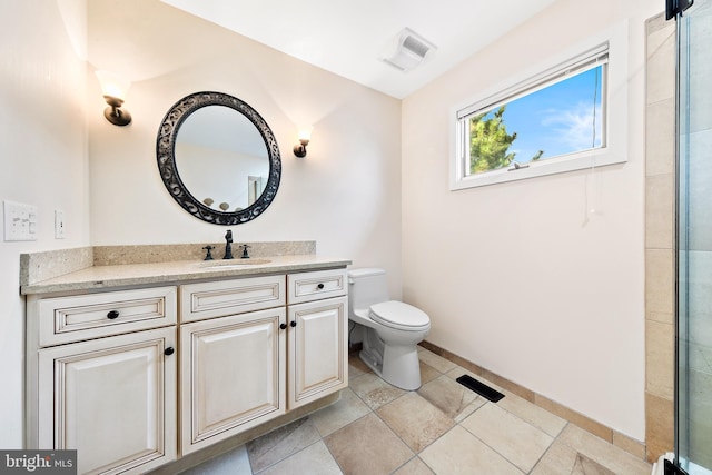 1039 Long Beach Blvd, Long Beach Township, NJ 08008 - full bath with toilet, vanity, baseboards, and a shower with shower door