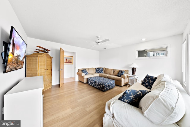 1039 Long Beach Blvd, Long Beach Township, NJ 08008 - living room with light wood-style floors, ceiling fan, and baseboards