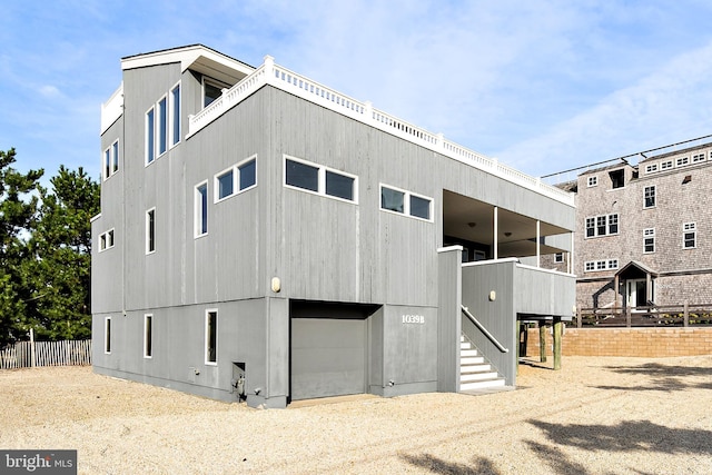 1039 Long Beach Blvd, Long Beach Township, NJ 08008 - view of property with a garage and stairs
