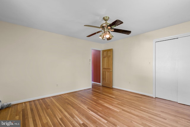 unfurnished bedroom featuring a closet, ceiling fan, and light hardwood / wood-style floors