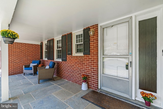 entrance to property with covered porch