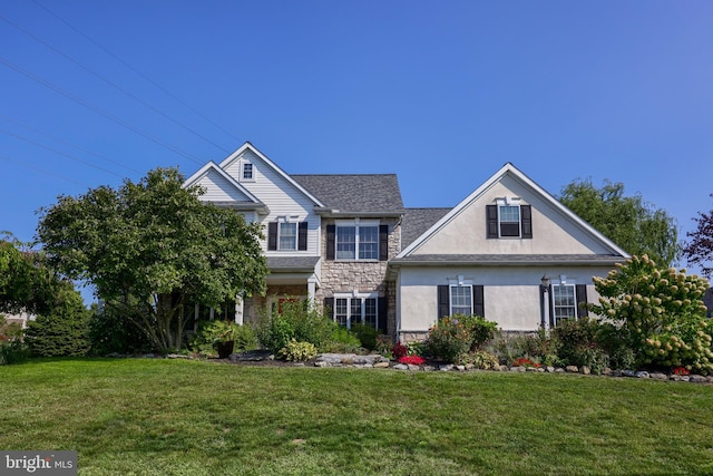 view of front of property with a front yard