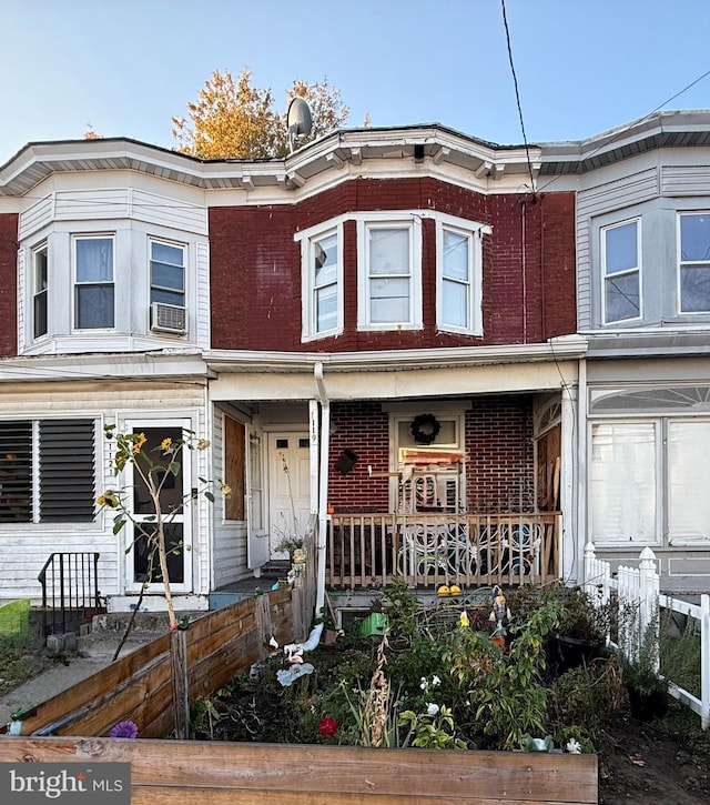 view of front of home featuring covered porch