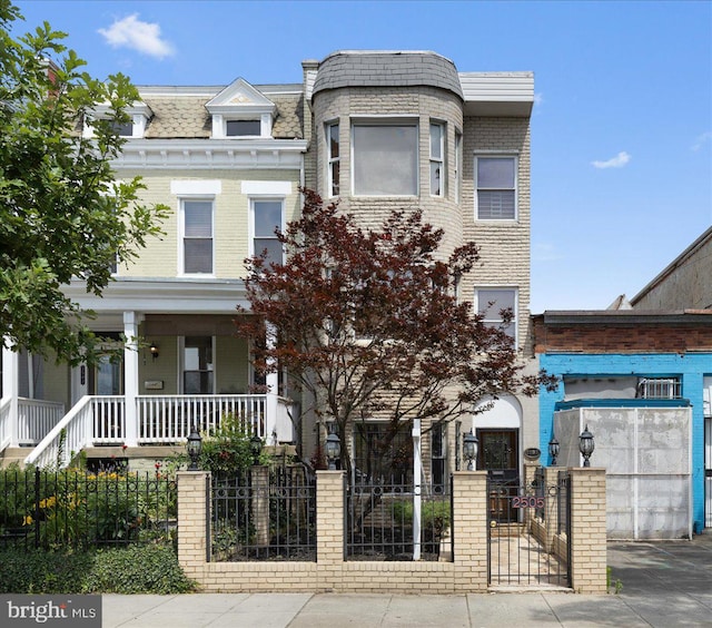 view of property featuring a porch