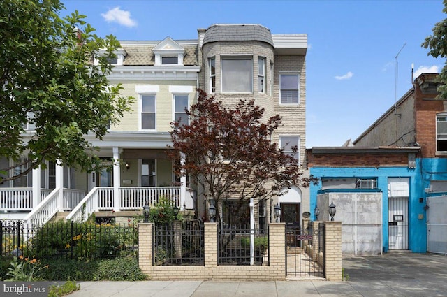 view of property featuring a porch