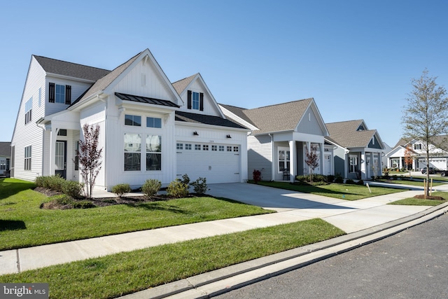 view of front facade with a front yard and a garage