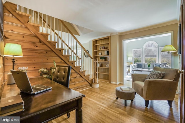 office featuring wood finished floors and crown molding