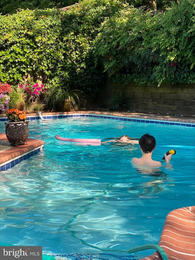 outdoor pool with fence