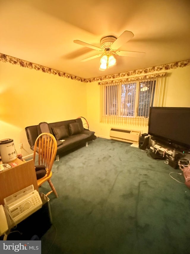 living area with carpet, a baseboard radiator, and ceiling fan