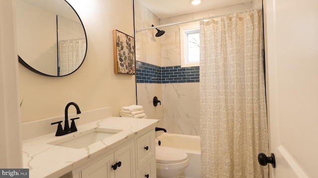 full bathroom with vanity, toilet, and shower / bath combo with shower curtain