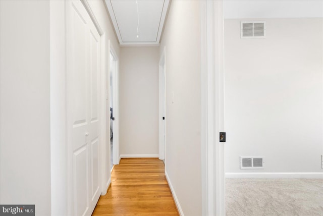 hallway featuring light hardwood / wood-style floors