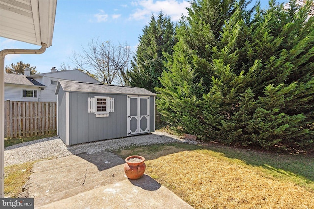 view of outbuilding featuring a yard