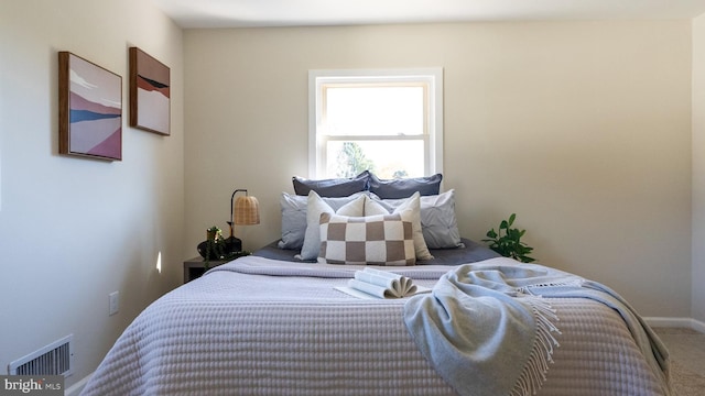 bedroom featuring carpet