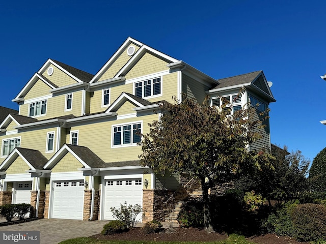 craftsman inspired home featuring a garage