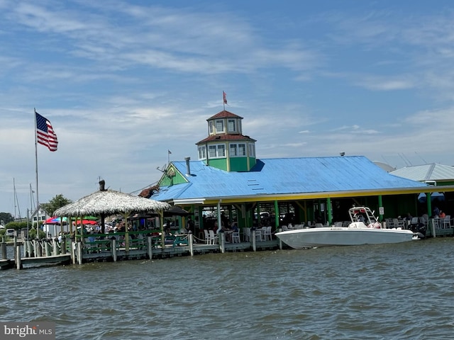 dock area featuring a gazebo and a water view