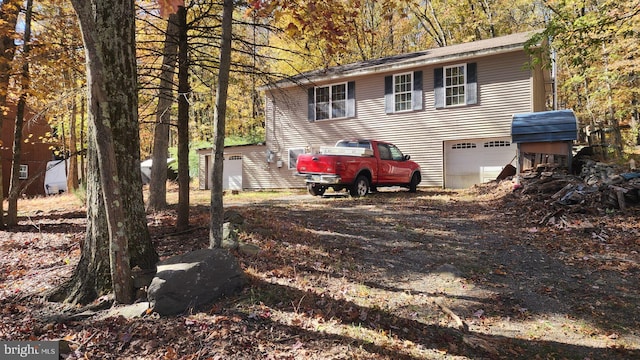 exterior space with a garage