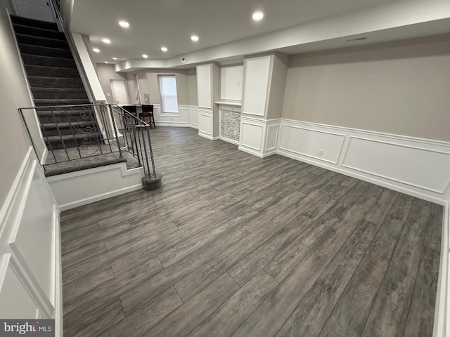 basement featuring dark wood-type flooring