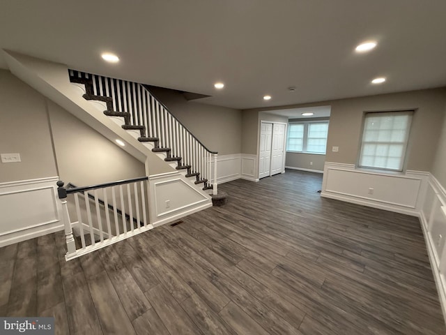 interior space with dark hardwood / wood-style flooring