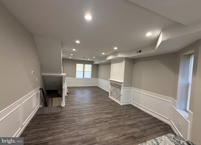 basement featuring dark hardwood / wood-style floors