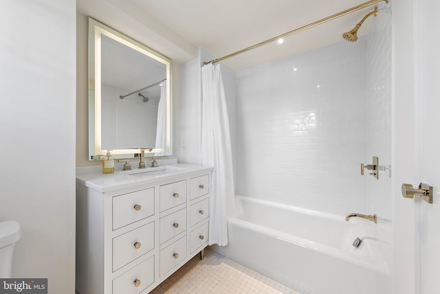 full bathroom featuring shower / tub combo with curtain, toilet, and vanity
