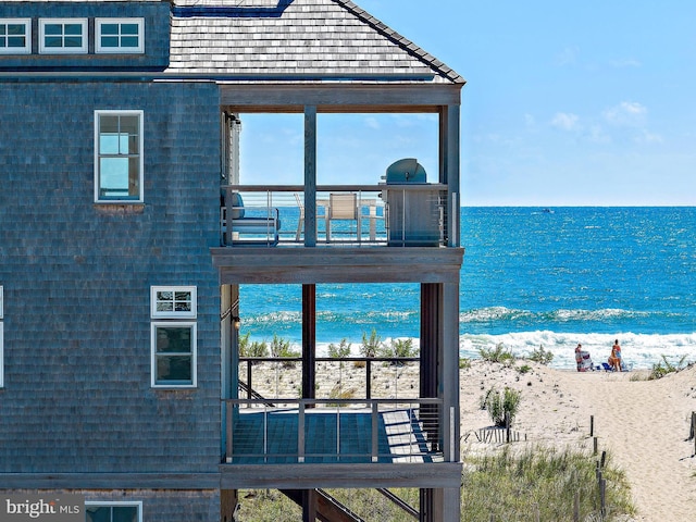 exterior space featuring a view of the beach