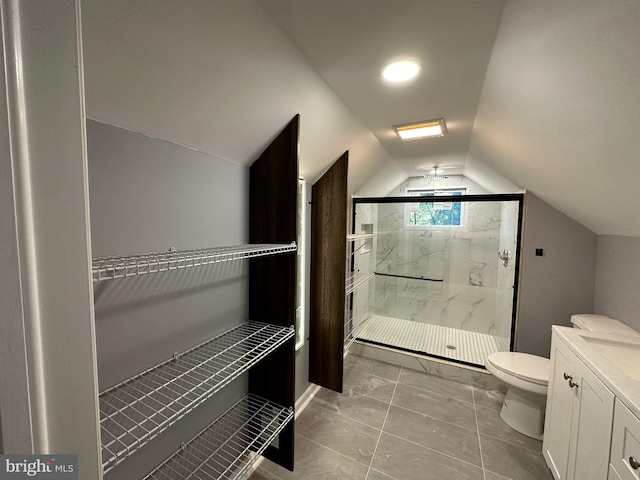 bathroom featuring walk in shower, vaulted ceiling, ceiling fan, and toilet