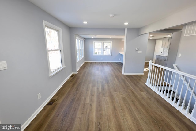 interior space with dark hardwood / wood-style floors