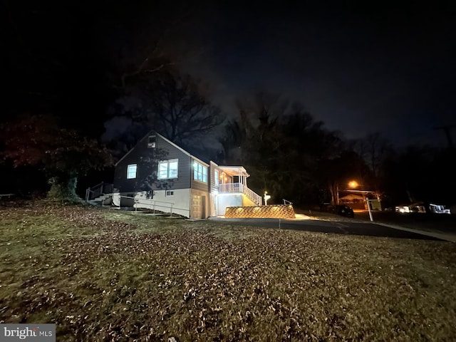 view of property exterior at twilight