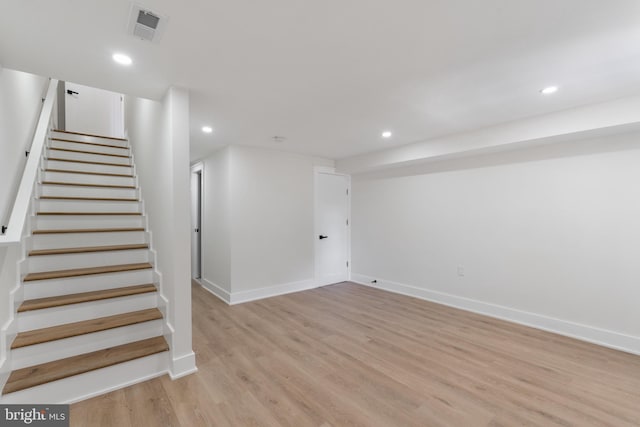 basement with light wood-type flooring