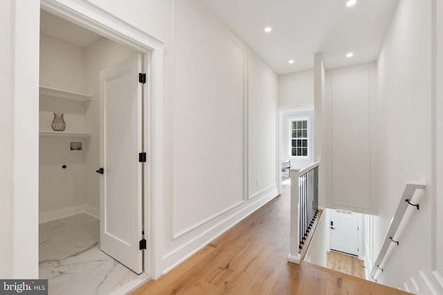 hall featuring light hardwood / wood-style floors