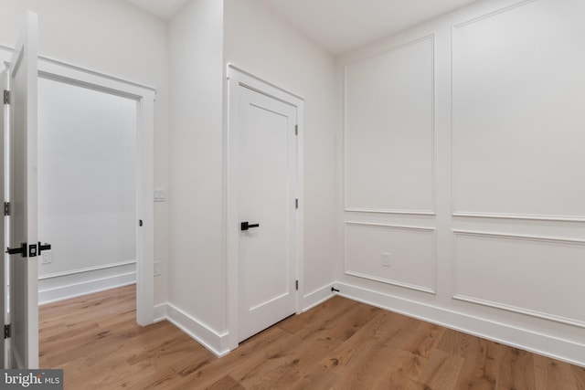 hall featuring light hardwood / wood-style floors