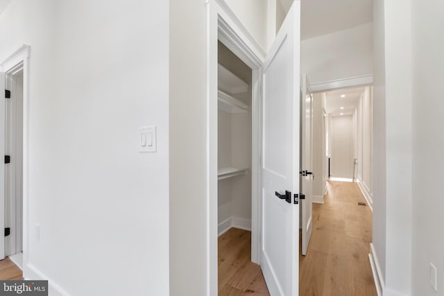 hall featuring light hardwood / wood-style flooring