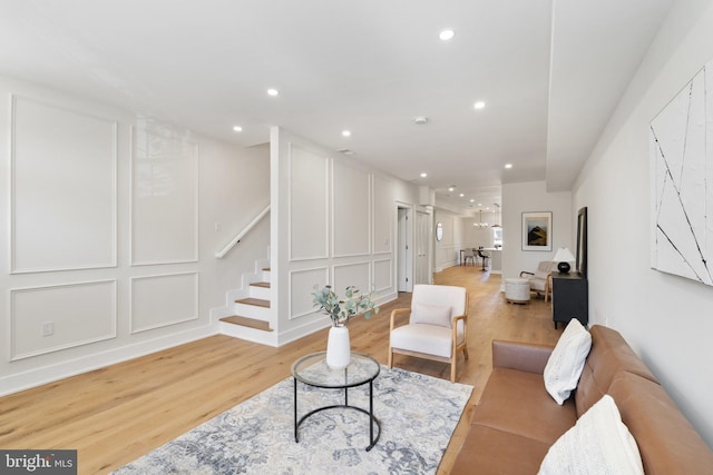 living room with light hardwood / wood-style floors