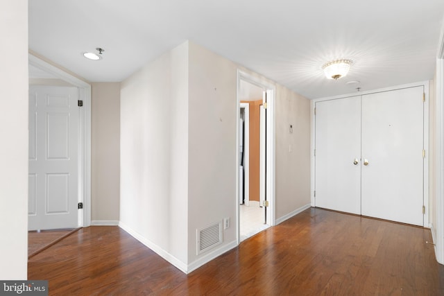 corridor featuring hardwood / wood-style flooring