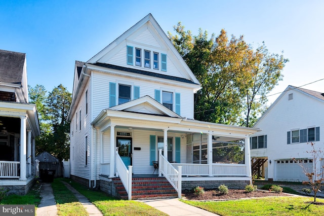 view of front facade with a garage and a porch