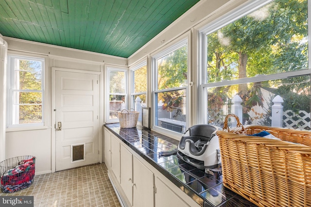 sunroom / solarium with wooden ceiling