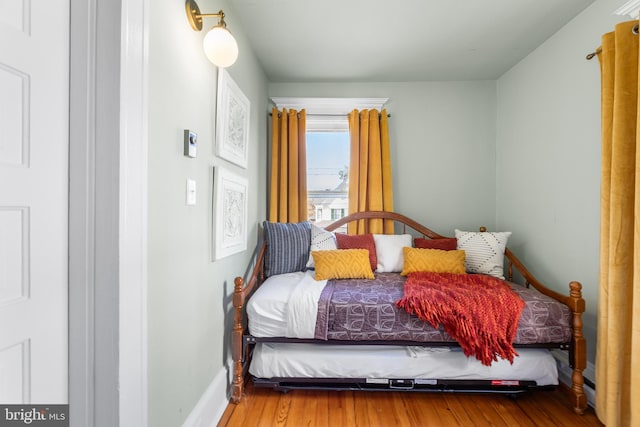 bedroom featuring wood-type flooring