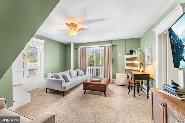 living room with ceiling fan, cooling unit, and light colored carpet