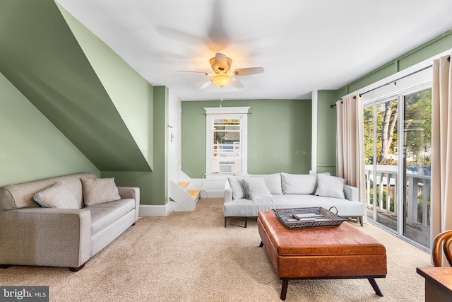 living room with light colored carpet and ceiling fan