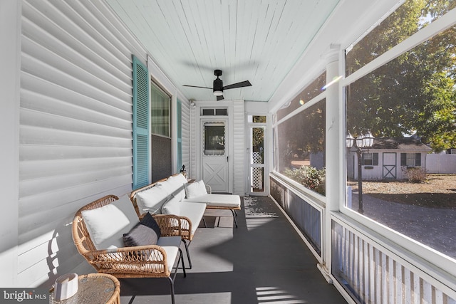 sunroom / solarium with ceiling fan