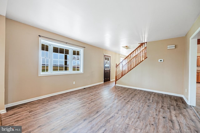 empty room with light wood-type flooring